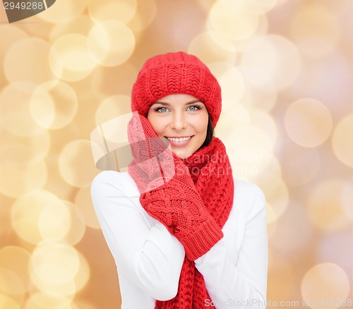 Image of smiling young woman in winter clothes