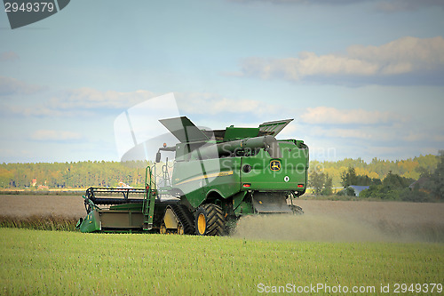 Image of John Deere Combine S670i on Rapeseed Field