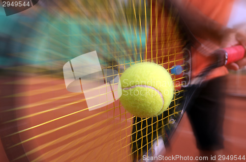 Image of male tennis player in action