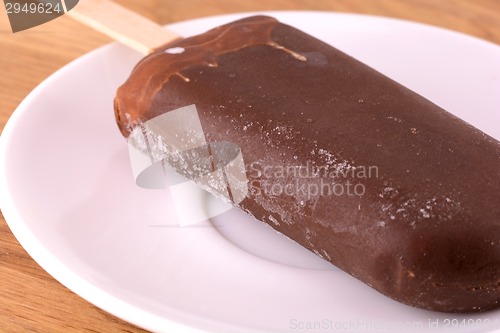 Image of chocolate ice cream on white plate