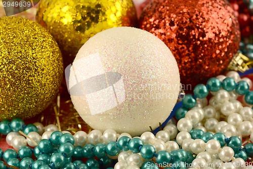 Image of Christmas background with new year balls and pearls set