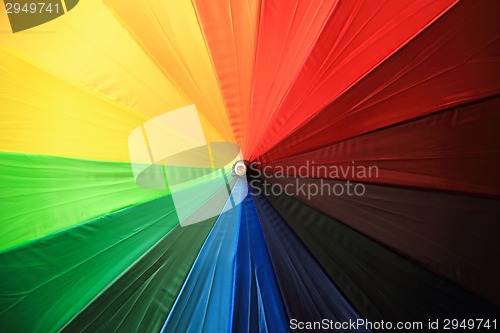 Image of color parasol as nice rainbow background 