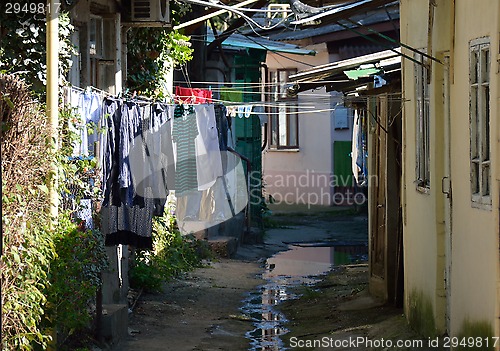 Image of Small backyard with picturesque houses