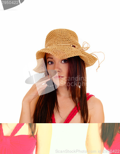 Image of Beautiful woman with straw hat.