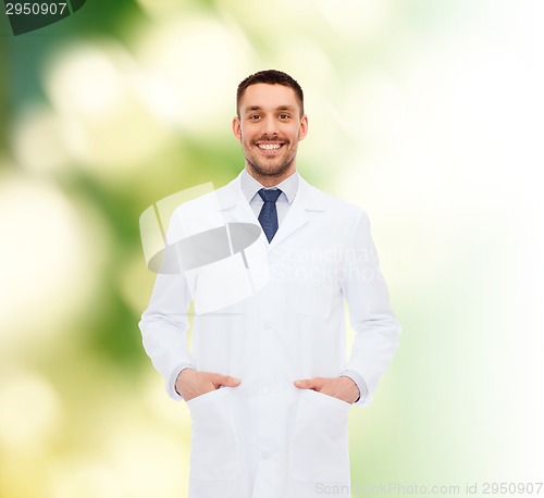 Image of smiling male doctor in white coat