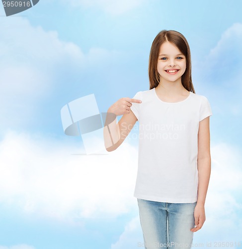 Image of smiling little girl in white blank t-shirt