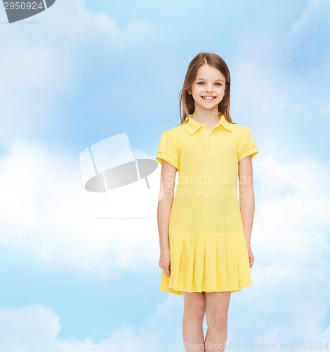 Image of smiling little girl in yellow dress