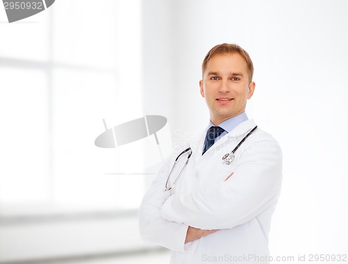 Image of smiling male doctor in white coat with stethoscope