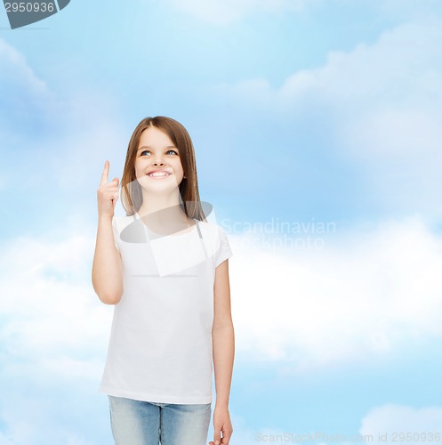 Image of smiling little girl in white blank t-shirt