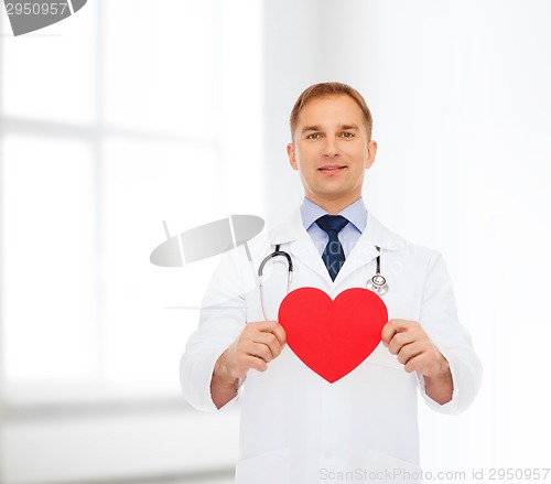 Image of smiling male doctor with red heart and stethoscope