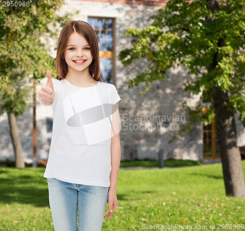 Image of smiling little girl in white blank t-shirt