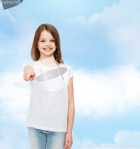 Image of smiling little girl in white blank t-shirt