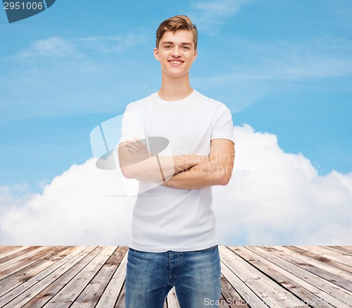 Image of smiling young man in blank white t-shirt