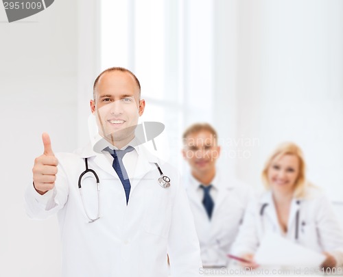 Image of smiling male doctor with stethoscope