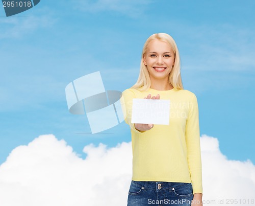 Image of smiling girl with blank business or name card