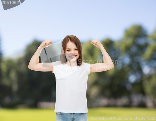 Image of smiling little girl in white blank t-shirt