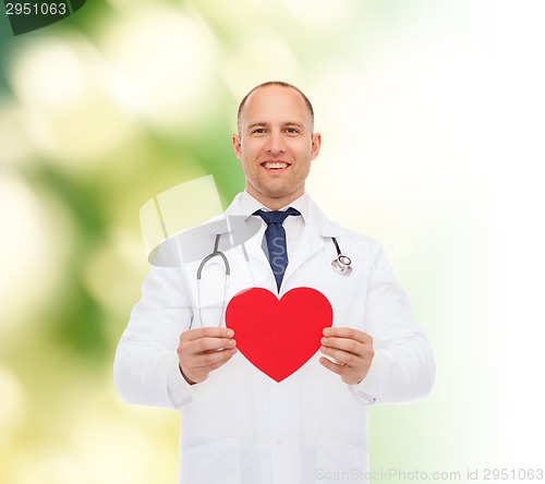 Image of smiling male doctor with red heart and stethoscope