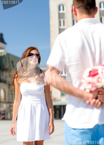 Image of smiling couple in city