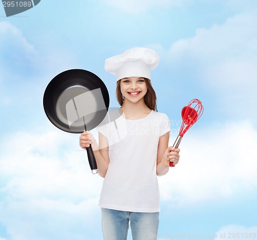 Image of smiling little girl in white blank t-shirt