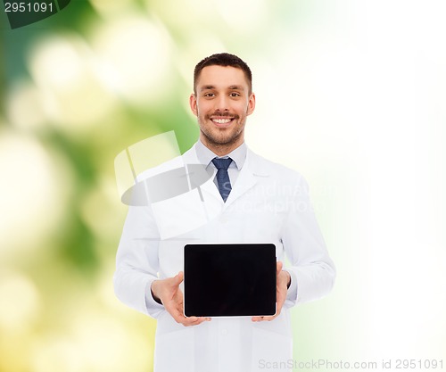 Image of smiling male doctor with tablet pc