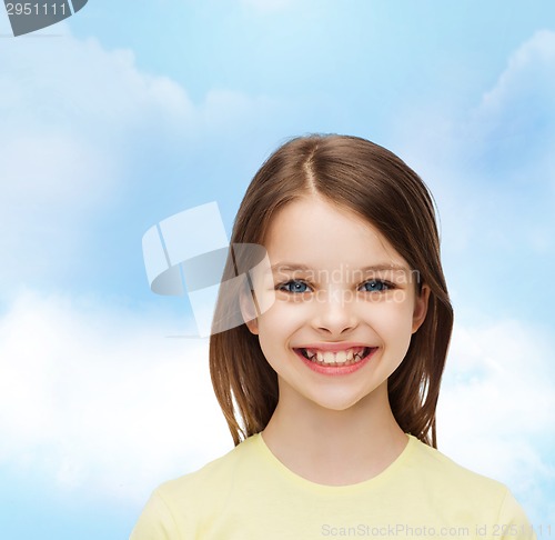 Image of smiling little girl over white background