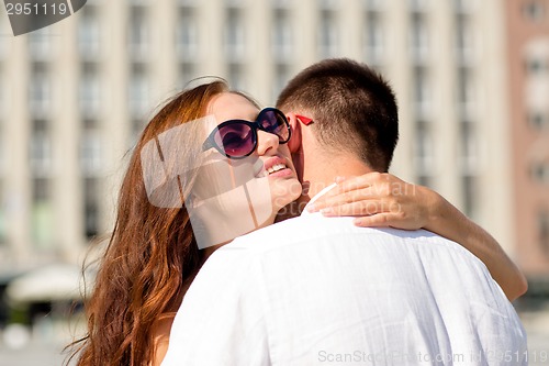 Image of smiling couple in city