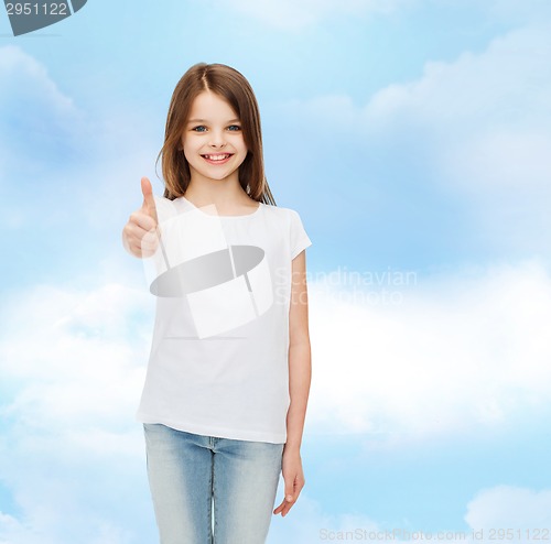 Image of smiling little girl in white blank t-shirt