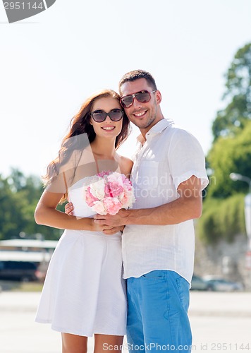 Image of smiling couple in city