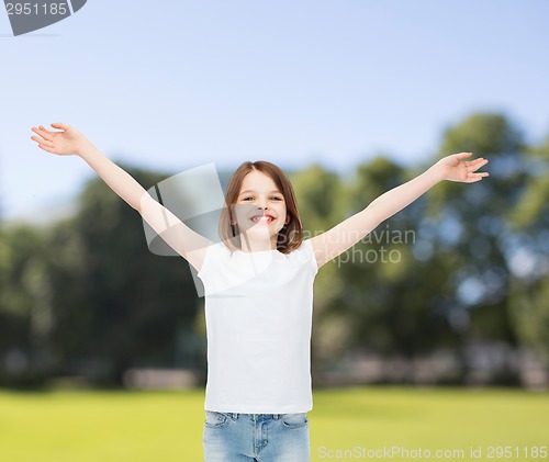 Image of smiling little girl in white blank t-shirt