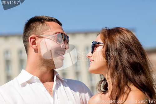 Image of smiling couple in city