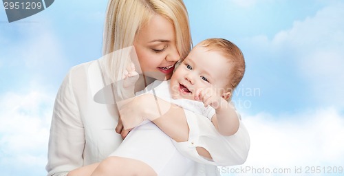 Image of happy mother with smiling baby