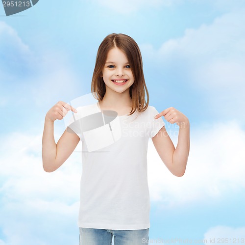 Image of smiling little girl in white blank t-shirt