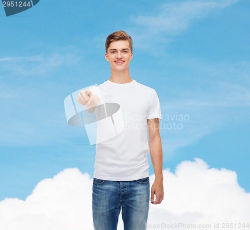 Image of smiling young man in blank white t-shirt