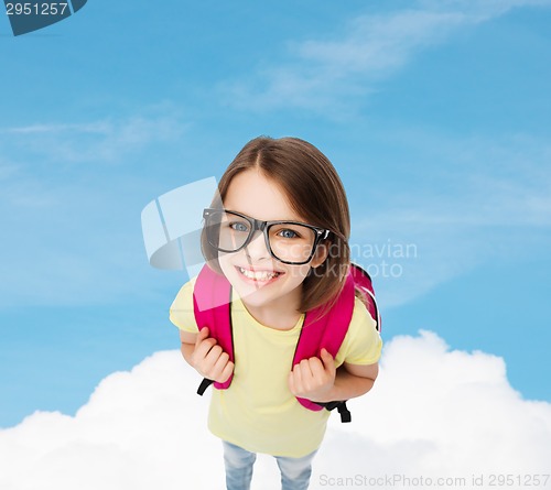 Image of happy smiling teenage girl in eyeglasses with bag