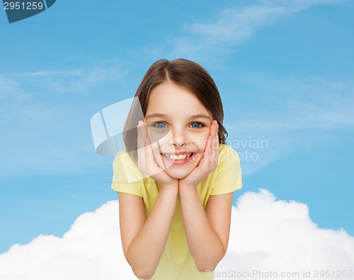 Image of smiling little girl over white background