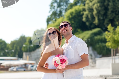 Image of smiling couple in city