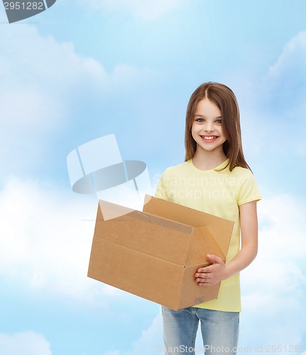 Image of smiling little girl in white blank t-shirt