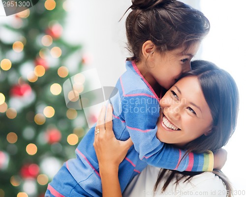 Image of hugging mother and daughter