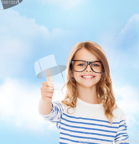 Image of little girl with black eyeglasses