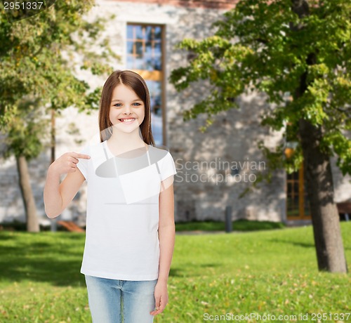 Image of smiling little girl in white blank t-shirt