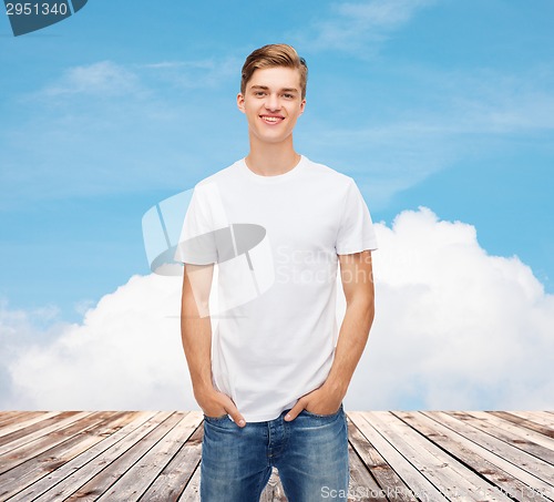 Image of smiling young man in blank white t-shirt