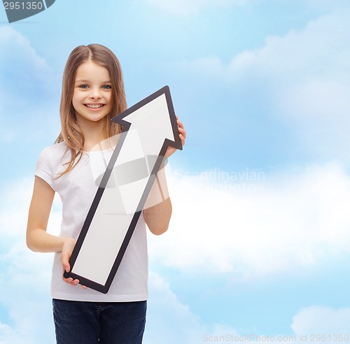 Image of smiling little girl with blank arrow pointing up