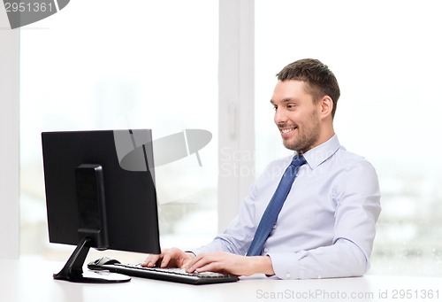 Image of smiling businessman or student with computer