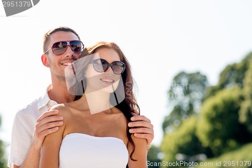 Image of smiling couple in city