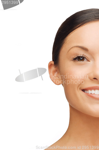 Image of half face portrait of beautiful young asian woman