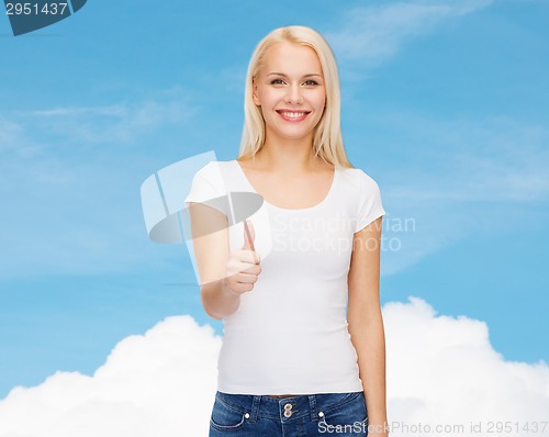 Image of woman showing thumbs up