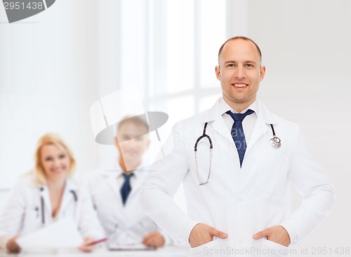 Image of smiling male doctor with stethoscope