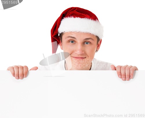 Image of Young man in Santa hat