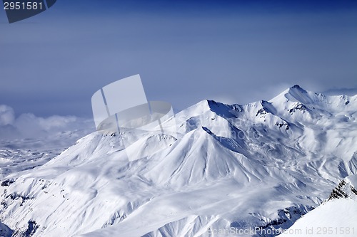 Image of Snowy mountains in mist