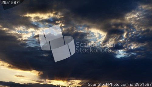 Image of Dark sunrise sky with rays